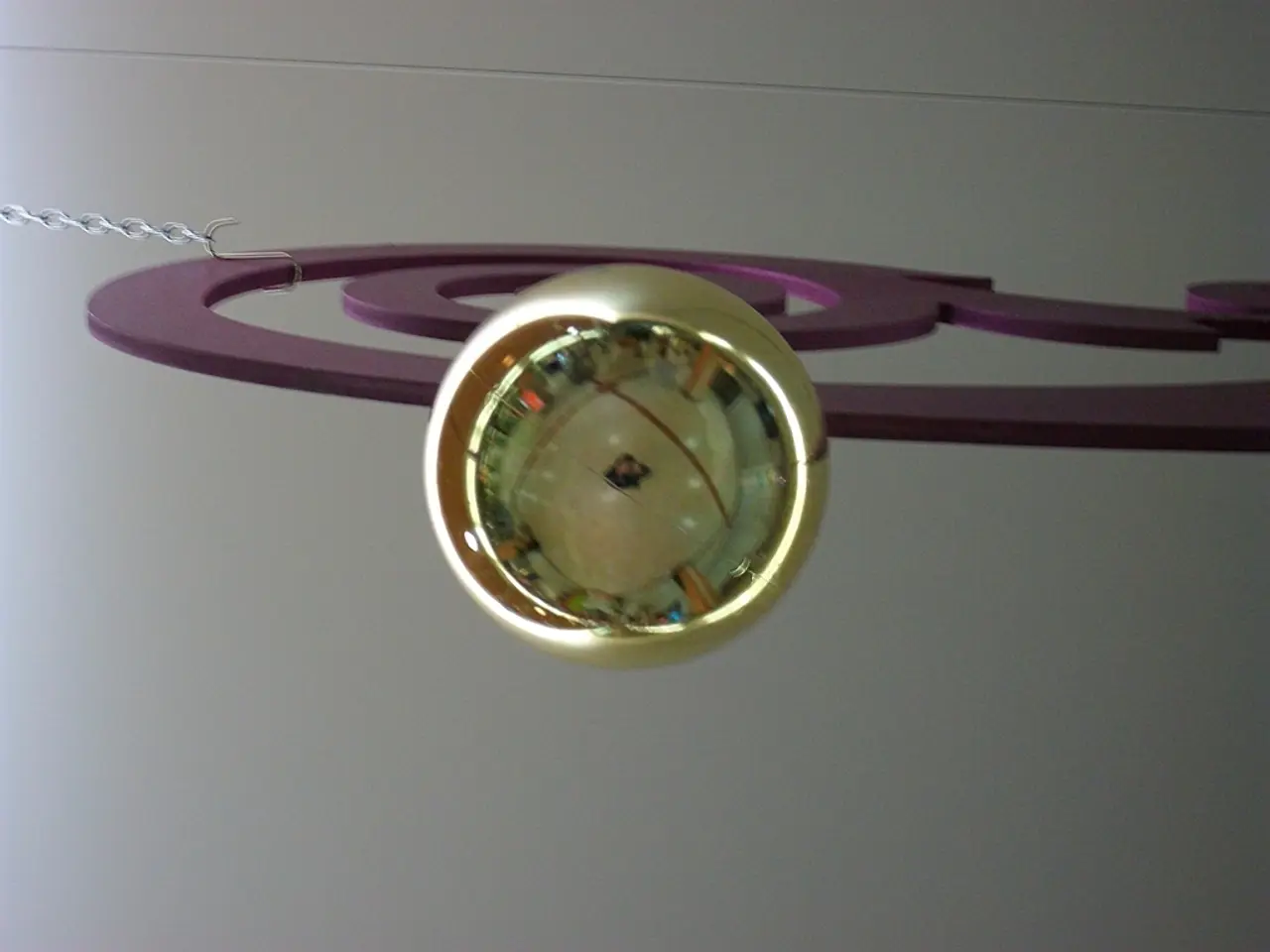 In this picture we can see something present here, on the left side there is a chain, in the...