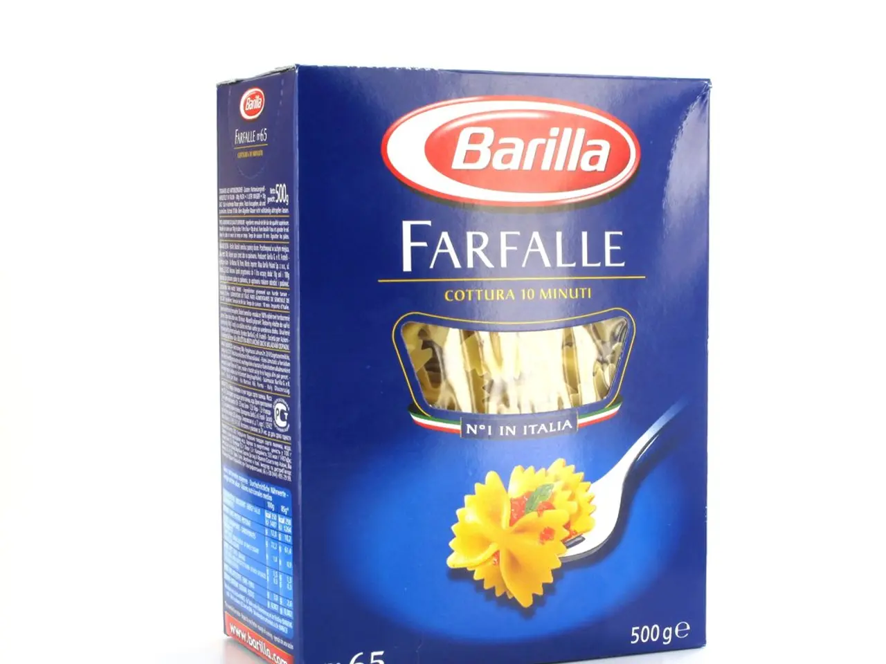 In this picture there is a box on a white surface. At the bottom towards left, there is text and...