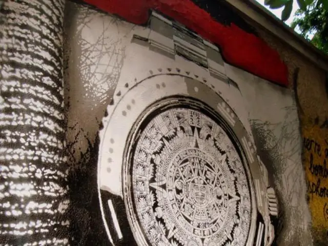 In this image there is a painting on the wall on which we can see there is a watch with some...