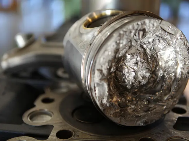 In the picture we can see a metal on the tool, and the background is not clear.