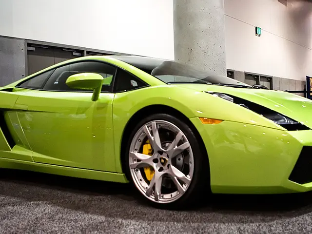 this picture shows a lamborghini sports car and a pillar